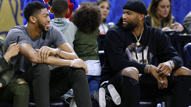 Anthony Davis talks to DeMarcus Cousins during the NBA All-Star Celebrity Game at the Mercedes-Benz Superdome during All Star Weekend. Now it appears these two will be teammates.