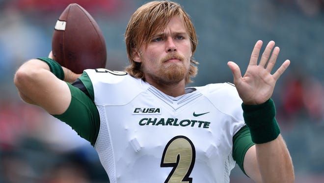 Charlotte QB Kevin Olsen was arrested on felony rape charges.