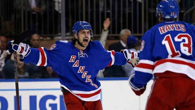 New York Rangers forward Mats Zuccarello (36) celebrates scoring a goal against the Montreal Canadiens during the second period in Game 6.