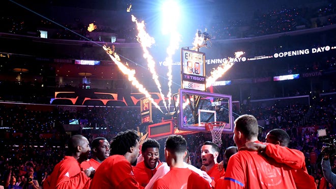 Los Angeles Clippers huddle during pregame introductions before a game against the Utah Jazz.