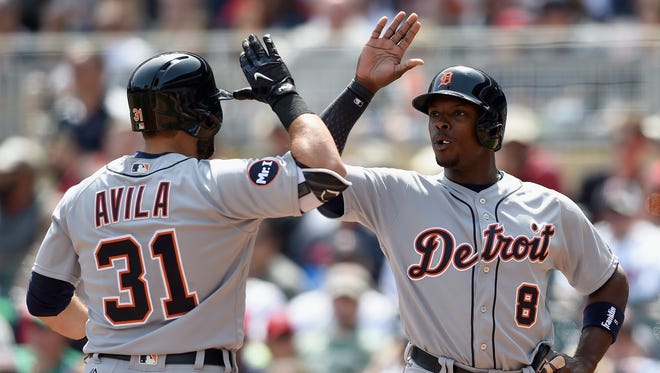 Tigers' Justin Upton congratulates Alex Avila on a two-run home run against the Twins during the second inning April 23, 2017 in Minneapolis.