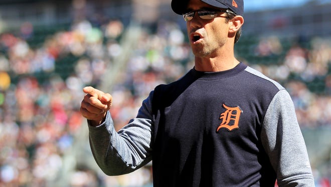 Tigers manager Brad Asumus leaves the field in the fifth inning of the Tigers' 5-4 win over the Twins Saturday in Minneapolis.