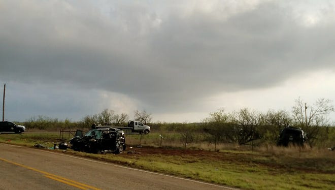 Texas Department of Public Safety troopers investigate a two-vehicle crash that left several storm chasers dead Tuesday , March 28, 2017, near Spur, Texas. Tornadoes had been reported nearby at the time of the crash and heavy rain had been reported in the area, according to the National Weather Service.