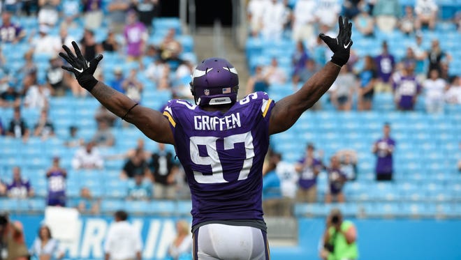 Vikings defensive end Everson Griffen celebrates a big fourth-quarter sack against the Panthers.