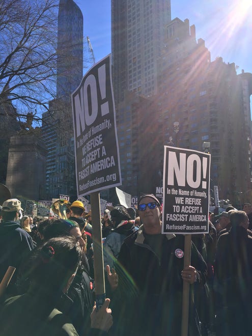 People gather for the New York City anti-Trump #NotMyPresidentsDay rally.