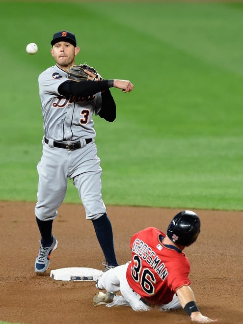 Twins DH Robbie Grossman is out at second base as Tigers second baseman Ian Kinsler turns a double play during the fourth inning of the Tigers' 6-3 loss Friday in Minneapolis.