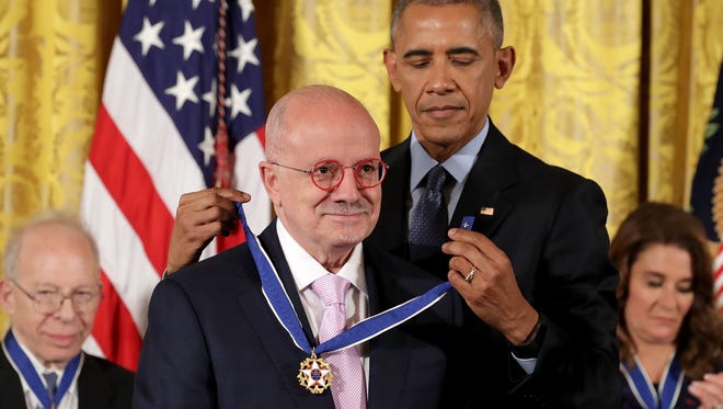 President Barack Obama awards the Presidential Medal of Freedom to higher education advocate and Miami Dade College President Eduardo Padron.