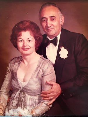 Mary Acerra, 86, and Ferdinando Acerra, 89, at their 25th anniversary in 1976. The couple died within hours of each other Monday after celebrating their 65th anniversary.