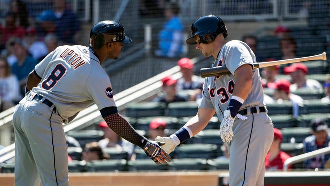 Apr 22, 2017; Minneapolis, MN, USA; Detroit Tigers leftfielder Justin Upton celebrates with catcher James McCann after hitting a home run in the third inning against the Minnesota Twins at Target Field.
