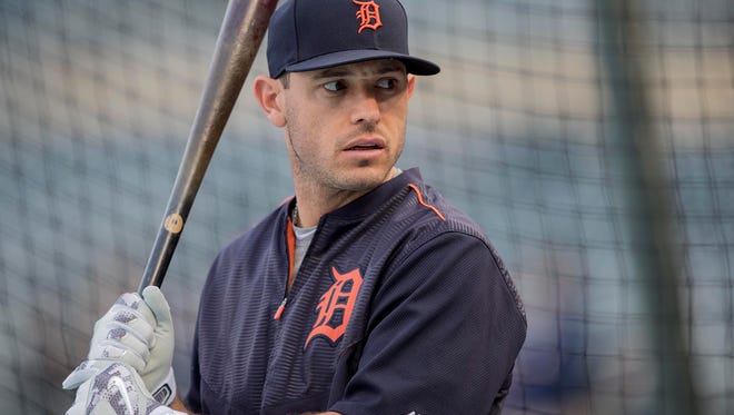 Tigers second baseman Ian Kinsler (3) looks on during batting practice before a game Friday in Minneapolis.