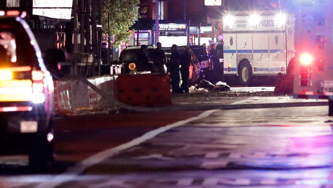 New York City Police officers respond to the scene of an explosion in Chelsea.