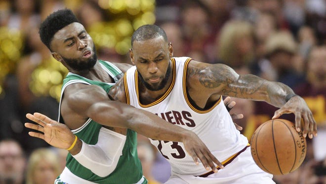 Boston Celtics forward Jaylen Brown (7) defends Cleveland Cavaliers forward LeBron James (23) during the first half in Game 3 of the Eastern Conference finals.