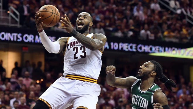 LeBron James (23) drives to the basket against Boston Celtics forward Jae Crowder (99) during the fourth quarter in Game 4 of the Eastern Conference finals.