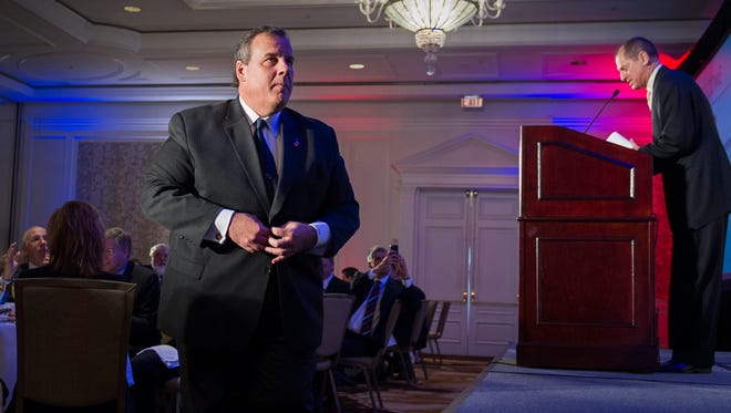 Gary Shapiro, president and CEO,  Consumer Electronics Association, right, announces N.J. Gov. Chris Christie before Christie spoke before the Northern Virginia Technology Council (NVTC) in Tyson's Corner, Va., Friday, May 1, 2015. (AP Photo/Cliff Owen)