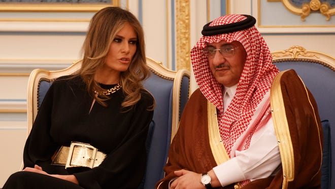 First lady Melania Trump talks with Saudi Crown Prince Muhammad bin Nayef during a ceremony to present The Collar of Abdulaziz Al Saud Medal to President Trump, at the Royal Court Palace on May 20, 2017, in Riyadh.