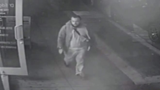 A surveillance image made available by the New Jersey State Police showing Ahmad Khan Rahami. New York, New Jersey and Federal authorities say Rahami is wanted in connection with multiple bombing incidents in New Jersey and New York City.