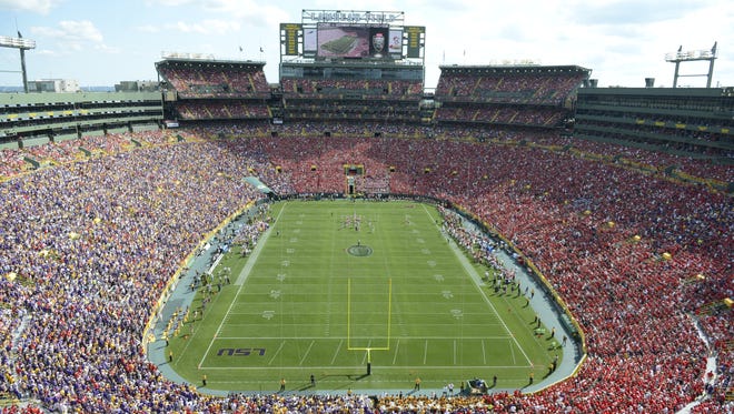Wisconsin Badgers red and LSU Tigers purple fill Lambeau Field on Sept. 3.