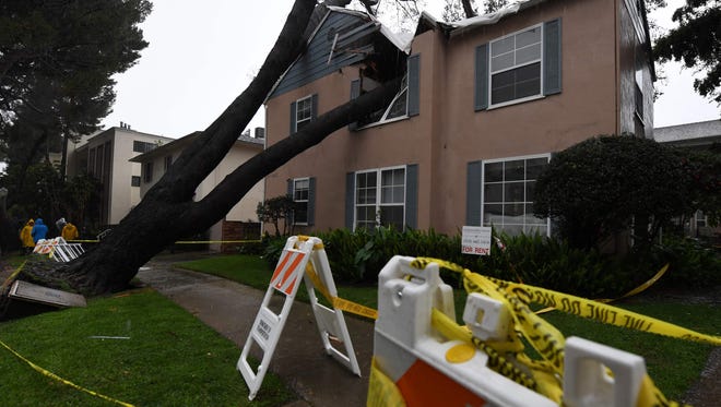 A damaged apartment building after a 75 foot tall tree crashed onto it as the strongest storm in six years slams Los Angeles, California, on February 17, 2017.