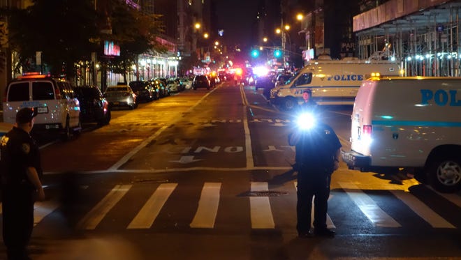 Police block a road after an explosion in New York on September 17, 2016.            
An explosion in New York's Chelsea neighborhood injured multiple people Saturday night, police said.