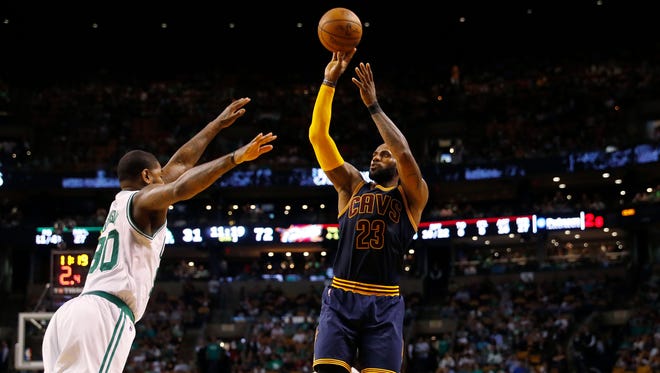 Cleveland Cavaliers forward LeBron James (23) shoots over Boston Celtics forward Amir Johnson (90) during the second half in Game 2 of the Eastern Conference finals.