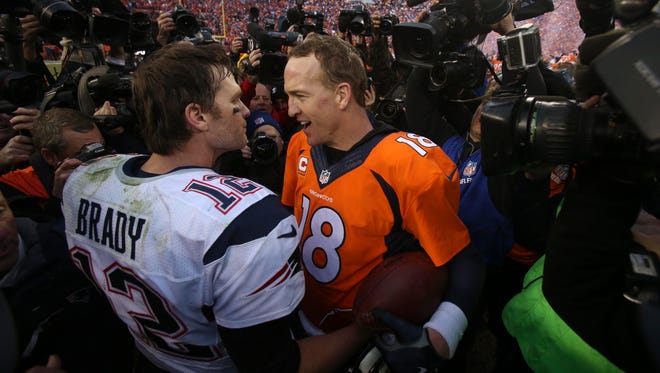 Brady and Denver Broncos quarterback Peyton Manning (18) meet on the field after the Patriots' loss in the 2015 AFC Championship football game. The meeting was the last between the two rivals, with Brady holding an 11-6 record against Manning.