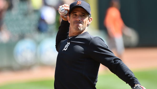 Tigers manager Brad Ausmus loosens up before a game against the Twins, Sunday, April 23, 2017 at Target Field in Minneapolis.