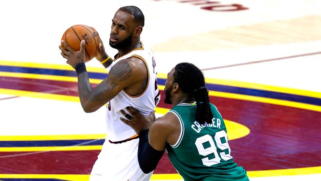 Cleveland Cavaliers forward LeBron James (23) is defended by Boston Celtics forward Jae Crowder (99) during the second half in Game 4 of the Eastern Conference finals.