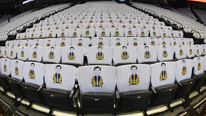 A view of Craig Sager-themed T-shirts on the back of the seats provided for all fans in attendance of the Warriors-Spurs game.