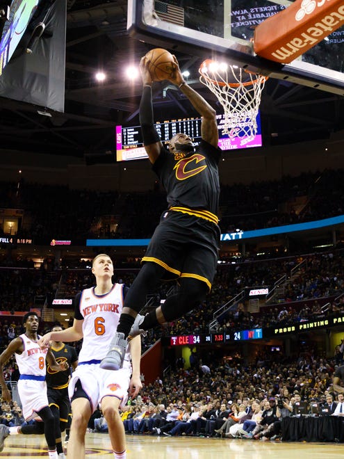 LeBron James soars for a dunk.