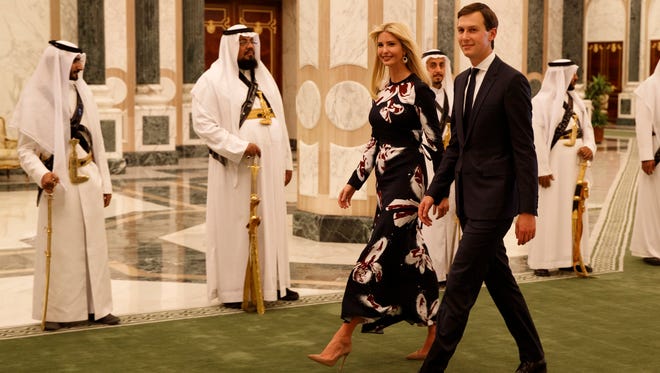 White House senior adviser Jared Kushner, right, walks with Ivanka Trump at the Royal Court Palace onMay 20, 2017, in Riyadh.