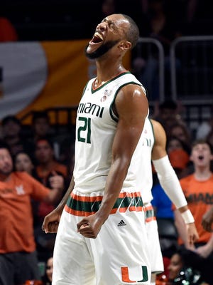 Miami Hurricanes forward Kamari Murphy (21) reacts during the first half against the Clemson Tigers at Watsco Center.