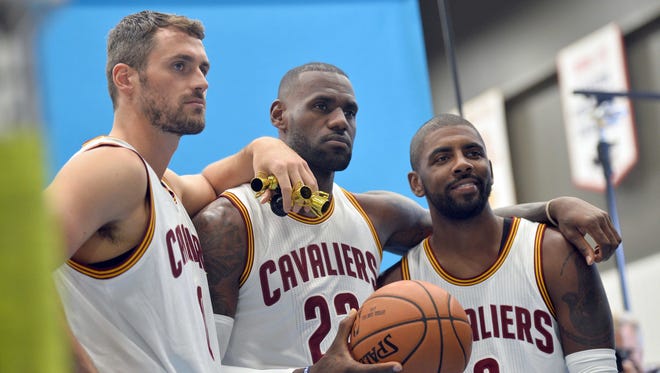Kevin Love, LeBron James and Kyrie Irving at Cavaliers media day.