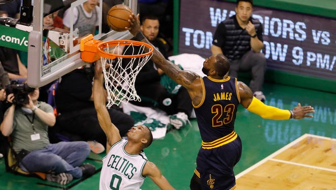 Cleveland Cavaliers forward LeBron James (23) blocks the shot of Boston Celtics guard Avery Bradley (0) during the first quarter in Game 2 of the Eastern Conference finals.