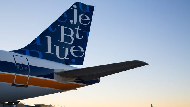 JetBlue unveils its new "RetroJet" special livery on an Airbus A320 at New York JFK airport on Nov. 11, 2016.