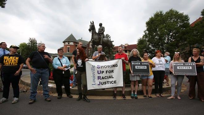 About 150 protesters rallied in front of the Castleman statue erected in Cherokee Triangle in Louisville, KY on Aug. 14, 2017. Despite the fact that others say the statue is related to John B. Castleman's service on the city's Board of Park Commissioners, protesters believe his service in the Confederacy is a more relevant issue and want to see it removed.