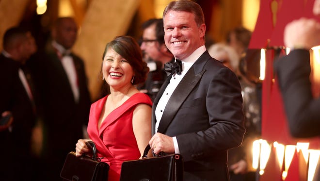 PricewaterhouseCoopers representatives Martha Ruiz and Brian Cullinan attend the 89th Academy Awards on Feb. 26, 2017.