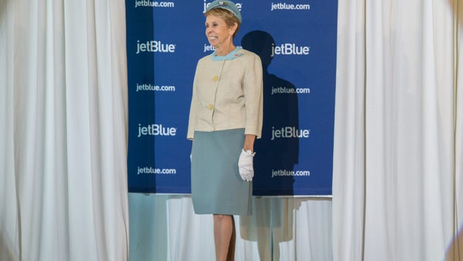 This former TWA flight attendant wore her original TWA uniform during JetBlue's retro-themed aviation fashion show at New York JFK on Nov. 11, 2016.
