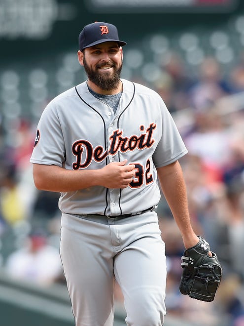 Tigers pitcher Michael Fulmer smiles as he walks off the field following the seventh inning against the Twins on April 23, 2017 at Target Field in Minneapolis.