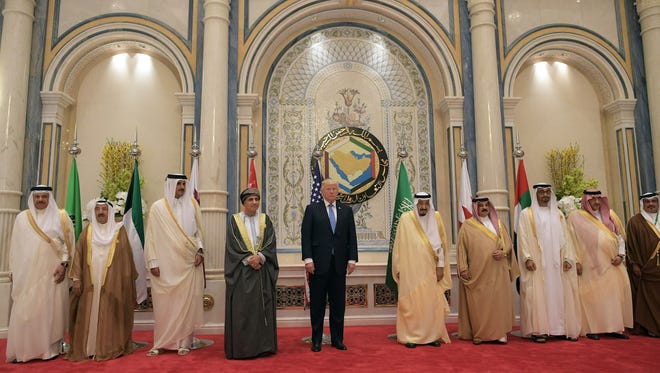 President Trump and Saudi's King Salman bin Abdulaziz al-Saud, right center, prepare to meet with leaders of the Gulf Cooperation Council in Riyadh on May 21, 2017.