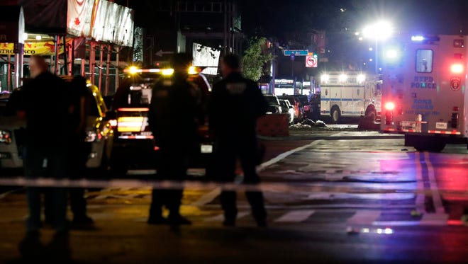New York City Police officers respond to the scene of an explosion in Chelsea.