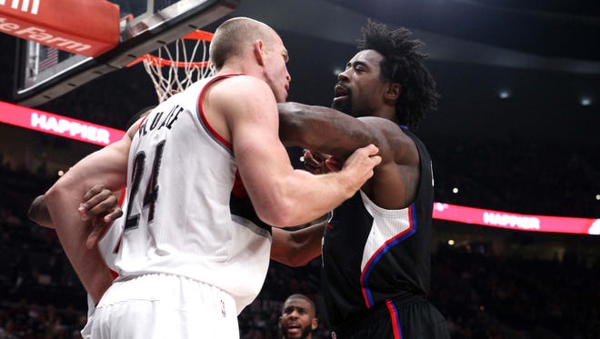 Mason Plumlee and DeAndre Jordan have some words with each other.