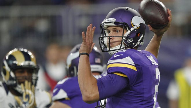 Vikings quarterback Joel Stave throws a pass during the first half of an NFL preseason football game against the Los Angeles Rams Thursday.