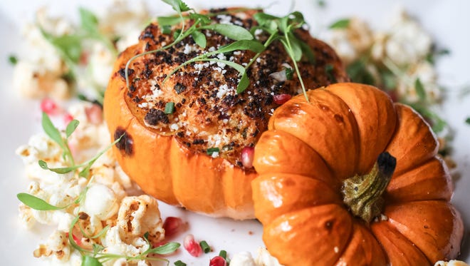 At Toloache in New York City, chef Julian Medina serves Calabazita Rellena in a roasted baby pumpkin stuffed with crab meat, chipotle, chihuahua cheese and truffle popcorn.