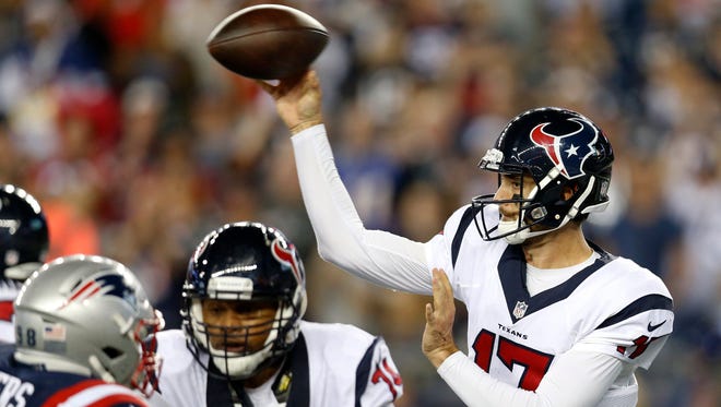 Houston Texans quarterback Brock Osweiler (17) makes a pass during the fourth quarter against the New England Patriots at Gillette Stadium.