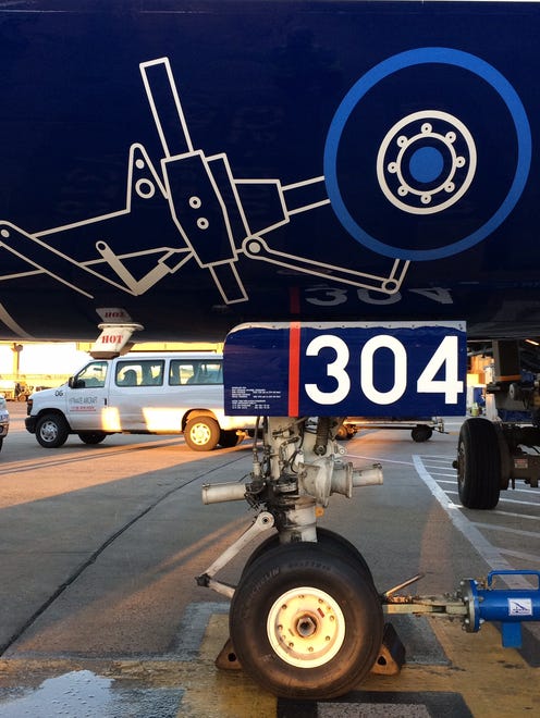 A close up of JerBlue's new "Blueprint" special livery on one of the carrier's Embraer E190 jets.