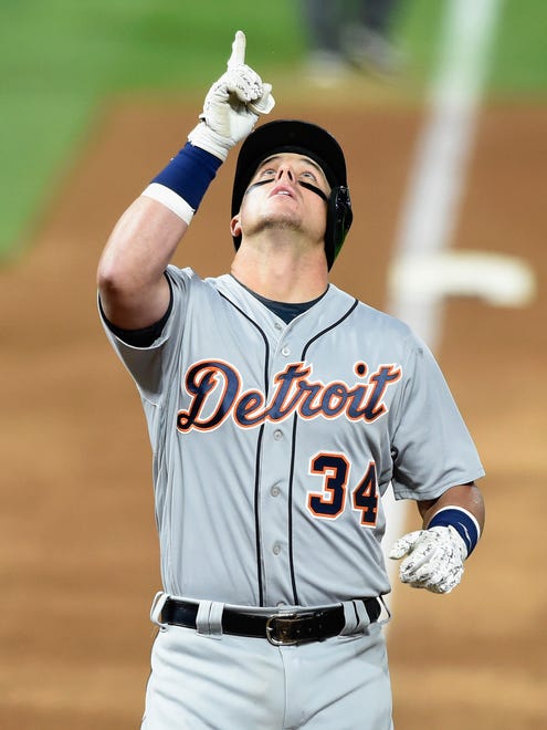 Tigers catcher James McCann celebrates a solo home run during the sixth inning of the Tigers' 6-3 loss Friday in Minneapolis.