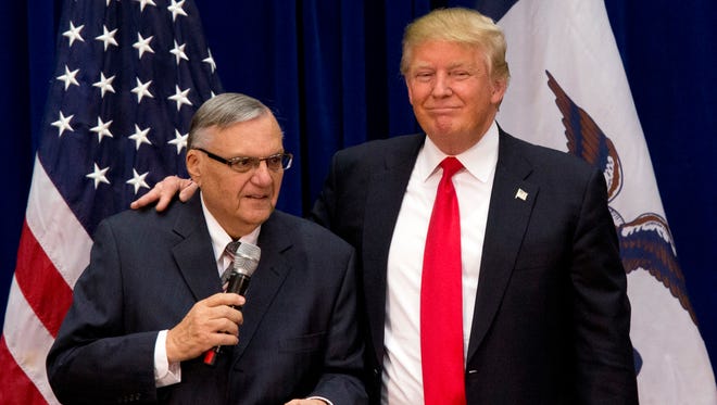 In this Jan. 26, 2016 file photo, Arizona Sheriff Joe Arpaio, then an Arizona sheriff, campaigns for Donald Trump at an event in Marshalltown, Iowa.