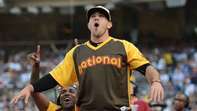 Fernandez reacts as teammate Giancarlo Stanton (not pictured) bats in the semifinals during the Home Run Derby in the 2016 All-Star Game at Petco Park.