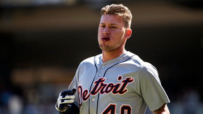 Apr 22, 2017; Minneapolis, MN, USA; Detroit Tigers centerfielder JaCoby Jones bleeds from his mouth after getting hit by a pitch in the third inning against the Minnesota Twins at Target Field.