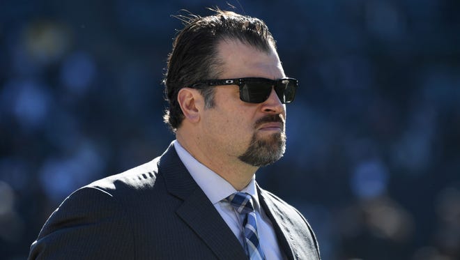 Indianapolis Colts general manager Ryan Grigson walks before an a NFL football game against the Oakland Raiders at Oakland-Alameda Coliseum.